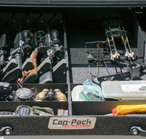 Cap Pack Storage System option for ATC truck caps and covers with hunting rifles and compound bow